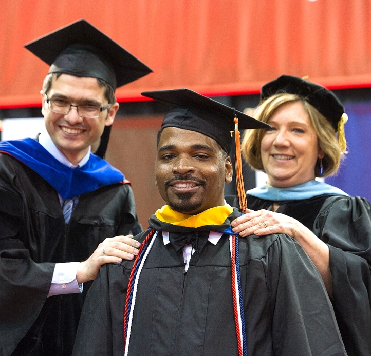 Graduate student hooding ceremony
